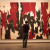 A man standing in front of a painting at the Clyfford Still Museum in Denver.