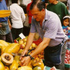 A fruit salesman at Mercado Central